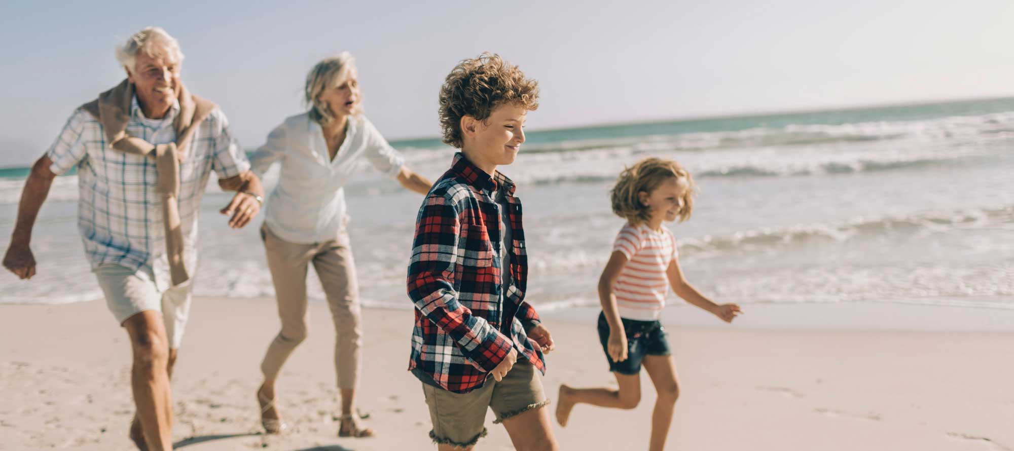 Grandparents walk the Jackonsville area beaches with their grandkids