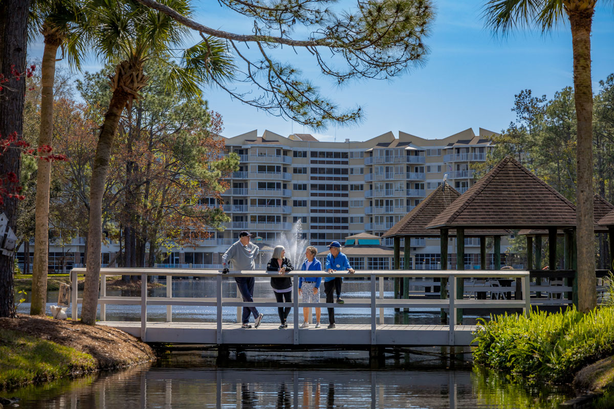 Cypress Bridge with residents enjoying the view